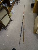 Vintage athlete's javelin and a part fishing rod