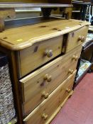 Modern pine chest of three long and two short drawers