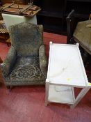 Antique upholstered easy chair and a white painted two tier tea table