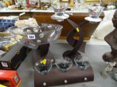 Three piece metal based candle and fruit bowl set