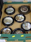 Seven framed Prattware pot lids (cracks to four, others reasonable, one with chipped rim)