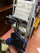 Mobility walker, two stepladders and an ironing board