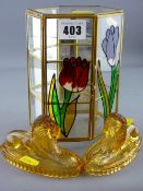 Pair of amber moulded glass reclining lions and a small glass floral decorated miniature trinket