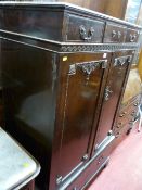 Polished two door compactum with dressing table and railback