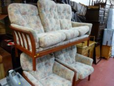 Excellent cottage style three piece suite of three seater settee and two armchairs with floral