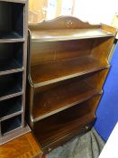 Modern waterfall style bookcase with base drawer