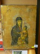 Interesting mother and child icon on an unframed panel bearing initials 'M-P O Y', 36 x 29 cms