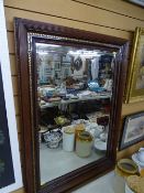 Large fancy framed bevelled wall mirror