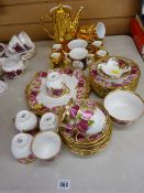 Parcel of Royal Albert pink and red rose decorated teaware, gold coloured lustre teaware etc
