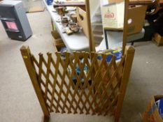Timber extending trellis and a dressing mirror