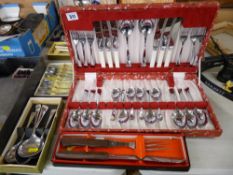 Cased cutlery and a boxed carving set