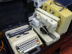 Cased Jones 681B sewing machine and an Olivetti Lettera 35 cased manual typewriter E/T
