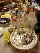 Two Staffs flatbacks, a parcel of Royal Doulton series plates including 'The Jester', 'The