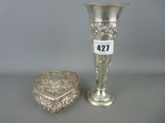 Hallmarked silver heart shaped trinket box and a London stamped trumpet vase with loaded base