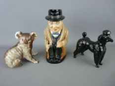 Royal Doulton Toby jug 'Winston Churchill', a Beswick model of a koala bear and a standard poodle