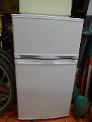 Compact fridge with upper freezer compartment and a Hoover 2100w Spirit upright vacuum cleaner E/T