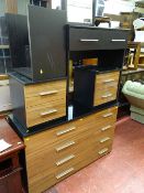 Modern bedroom eight drawer chest with two matching two drawer bedside cabinets and a modern black