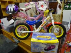 Apollo Cupcake infant's bicycle with stabilizers, an Apollo Whizzer infant's bicycle and boxed Storm