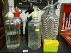 Six vintage soda syphons