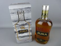 Boxed Jura bottle of ten year old single malt Scotch whisky