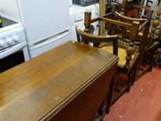 Drop leaf barley twist gate leg table and four chairs