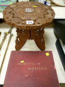Carved folding stool and a book - 'Beautiful Britain, The Scenery and Splendours of the United