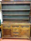 Period dresser with later carved frontage