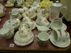 Quantity of teaware in mixed patterns - lustre, Queen Anne etc