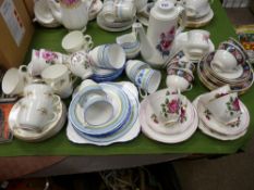 Parcel of pink rose and other floral decorated teaware
