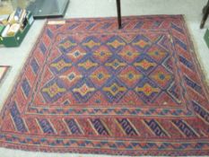 Cazak rug, red ground block diamond pattern centre with multiple border, 120 x 120 cms