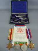 World War II group of four unmarked medals including a 1939-45 star, Africa star defence and victory