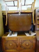 Polished wood drop leaf gate leg table, four chairs and a railback sideboard
