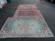 Parcel of three Persian style rugs