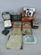 Vulcanite book type frame holding four daguerreotype portrait images (damage to frame), two