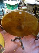 Circular tilt top tripod table