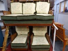 Three piece Bergere suite with floral upholstered cushions