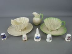 Two Belleek china cabinet cups and saucers and a small jug etc