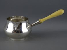AN EDWARD VII SILVER BRANDY PAN with ivory handle by The Goldsmith & Silversmith Company Ltd, London