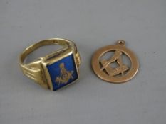 A TEN CARAT GOLD MASONIC RING and a nine carat gold circular pendant, 5.6 and 2.6 grms respectively,