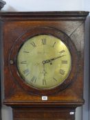 AN ANTIQUE OAK CIRCULAR BRASS DIAL LONGCASE CLOCK by Robert Jones, Ruthin, twin weight pendulum