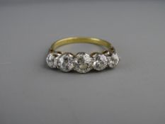 AN EIGHTEEN CARAT GOLD & PLATINUM FIVE STONE DIAMOND RING, visual estimate of each diamond being 0.