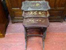 A NEST OF THREE ORIENTAL LACQUERWORK & GILT CHINOISERIE SIDE TABLES with open side detail, 69.5