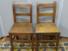 A HARLEQUIN SET OF SIX (FOUR PLUS TWO) ANTIQUE OAK FARMHOUSE CHAIRS with tie on seat pads