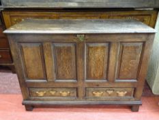 A CIRCA 1820 & LATER OAK MULE CHEST having a two plank top over a peg-joined four panel front with