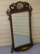 A GEORGIAN STYLE MAHOGANY WALL MIRROR having lower shelf with Sheraton type shell inlay, the pierced