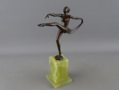 A JOSEF LORENZL BRONZE FIGURINE OF AN ART DECO DANCING GIRL signed to the back on an onyx base, 20