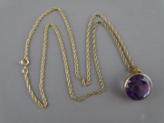 A NINE CARAT GOLD FINE TWIST NECK CHAIN with purple stone pendant, 8 grms gross