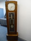 A FRENCH ART DECO WALNUT & CHROME LONGCASE CLOCK with triple weight chiming pendulum driven