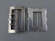 TWO VICTORIAN SILVER BUCKLES including a chased decorated example, maker Colin H Cheshire, the other
