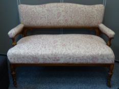 AN ATTRACTIVE 19th CENTURY WALNUT TWO SEATER SETTEE having carved detail and classical style